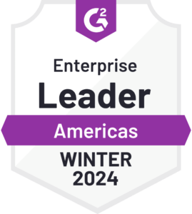 Award badge reading "Enterprise Leader Americas Winter 2024" from G2. The badge has a white shield background with purple accents.